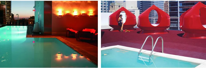 Piscine et cabines rouges du rooftop d'un hôtel de Downtown Los Angeles